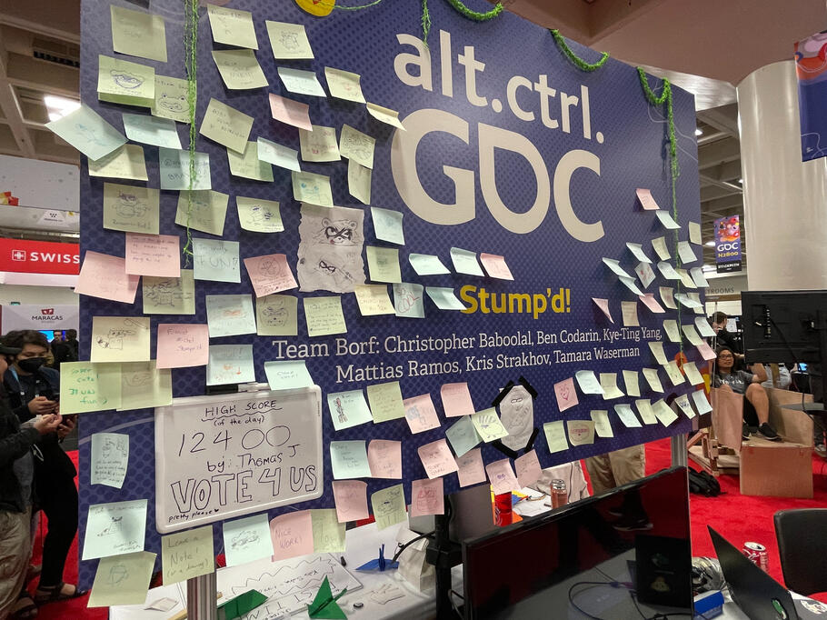 Stump'd wall with messages and drawings left by visitors and players.