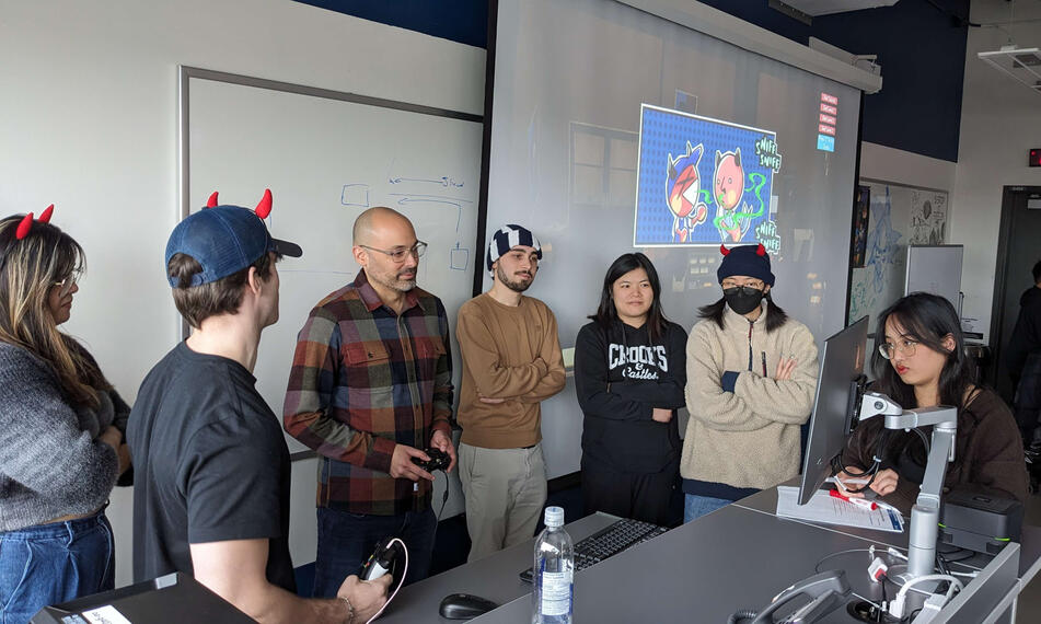 Playtesting our game with Richard Carillo.