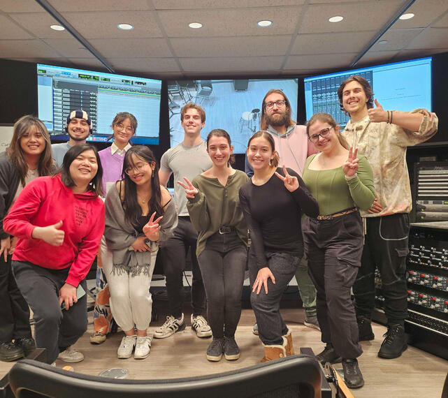 Team Ginkgo with the Voice Actors and the Music Scoring for Screen and Stage (MSSS) students in the recording studio.
