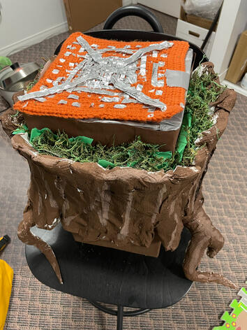 The painted and decorated "tree trunk" with the crochet square, reinforced with lots of tinfoil.